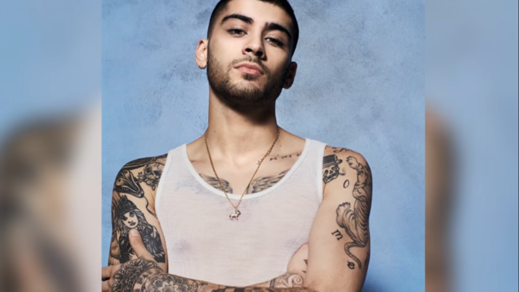 Zayn gets CONFUSING Initials Tattoo & Set to Tour with Justin Bieber?