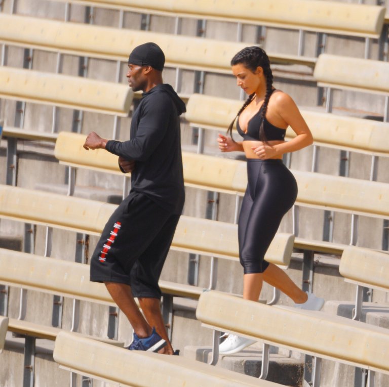 Here’s Kim Kardashian looking like a total goddess while working out after she trashed her Holiday Photos