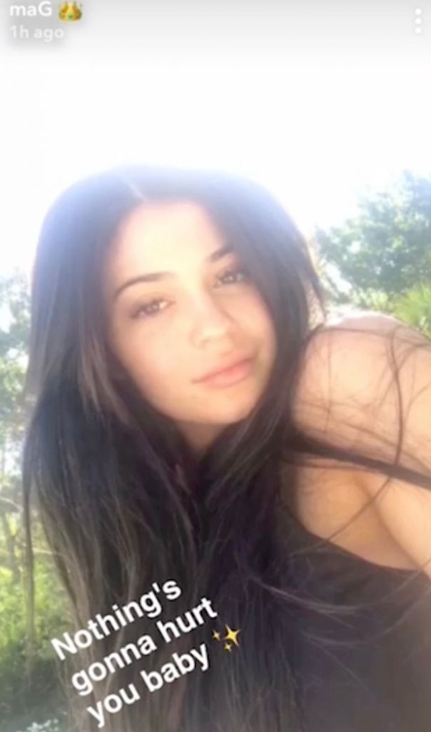 Kylie Jenner teases fans over pregnancy rumours with video captioned ‘nothing’s going to hurt you baby’