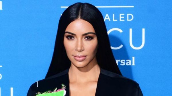 Kim Kardashian HINTS Surrogate is having twins & Twitter freaks out