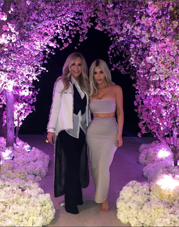 Kim Kardashian throws lavish shower for baby number three with Star Guests and a Sea of cherry blossom