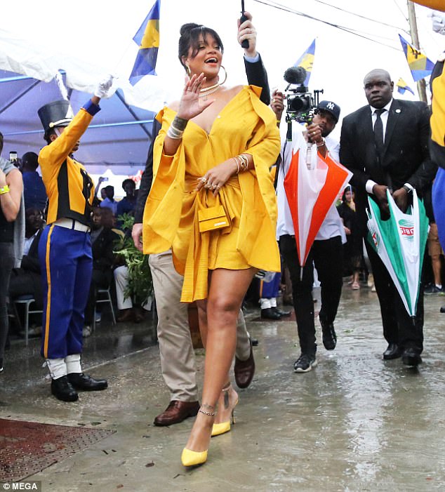 Rihanna turns heads in a bold yellow mini-dress as she attends renaming ceremony of the street she grew up on in Barbados