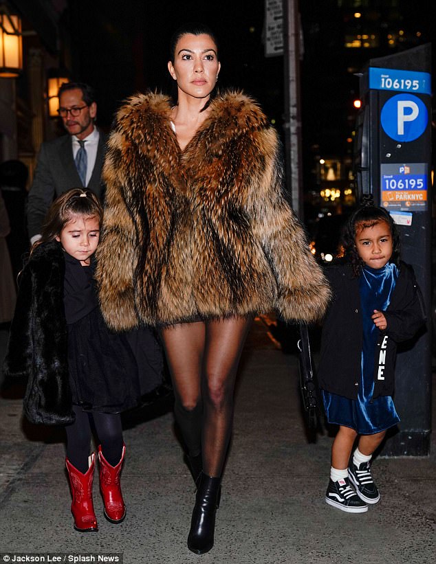 Girls’ night out! Kourtney Kardashian and daughter Penelope don fur coats as they head to dinner in New York with North West