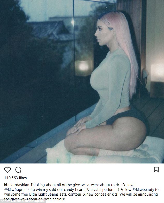 Kim Kardashian shows off derriere in skimpy underwear as she gazes out at the sky on Instagram