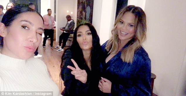 Kim Kardashian films Chrissy Teigen eating cake at her shower