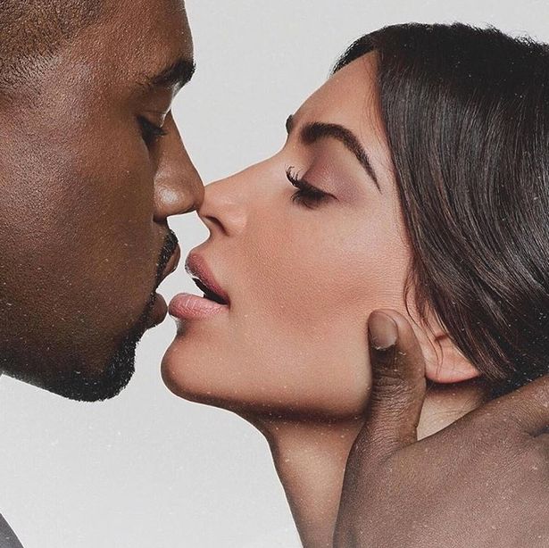 Kim Kardashian oozes sex appeal posing topless for sultry bed photo taken by Kanye West