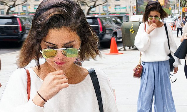 Selena Gomez sports white blouse and loose fitting trousers in NYC as new Single Release looms