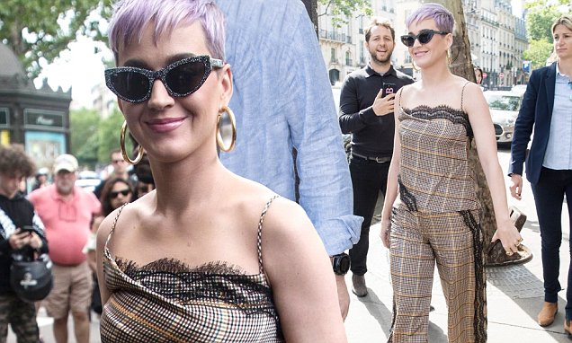 Katy Perry oozes Parisian chic in a stylish jumpsuit and cat-eye shades in the French capital