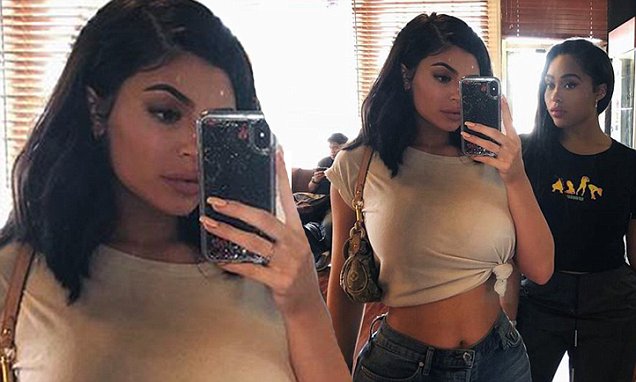 Kylie Jenner shows off enviably trim post baby midriff in mirror selfie with BFF Jordyn Woods