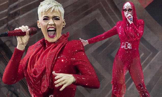 Katy Perry showcases her toned physique in glittering space age leotard in London