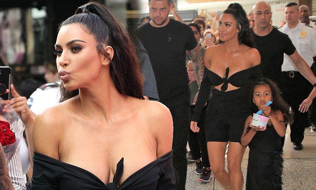 Kim Kardashian wows as she puts on VERY busty display in Stylish Black crop top at Beautycon