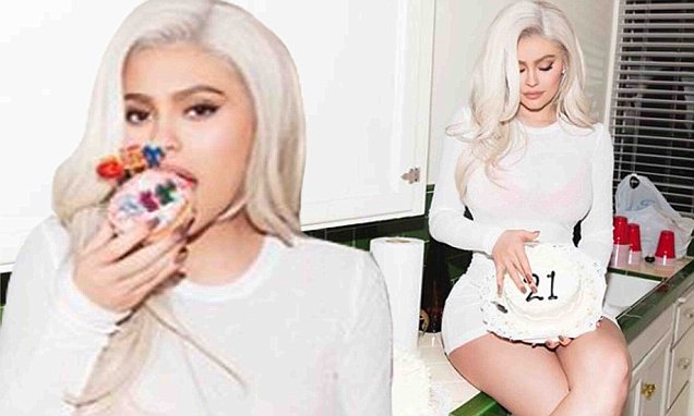 Kylie Jenner rocks a skintight white dress in BTS snaps from her 21st birthday photoshoot