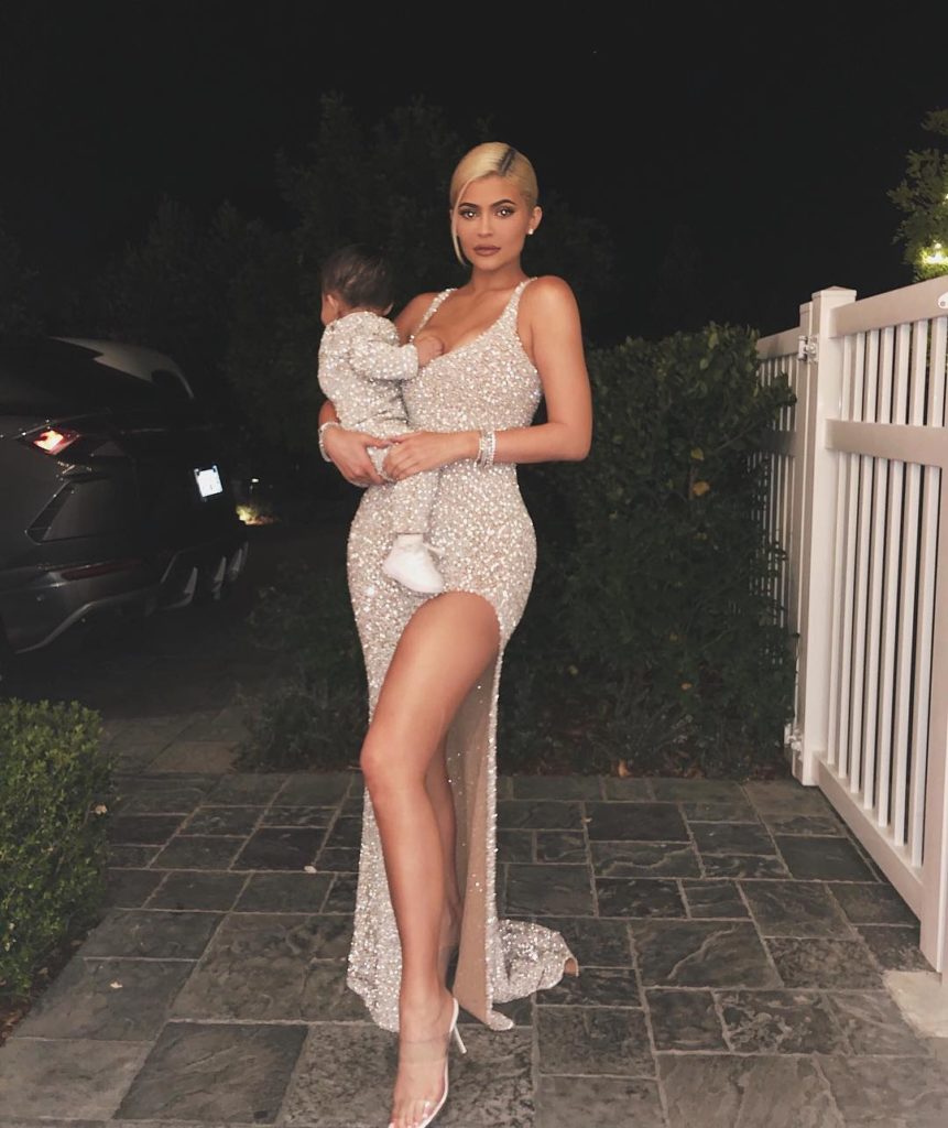 Kylie Jenner and daughter Stormi match in silver for annual Kardashian Christmas Eve bash