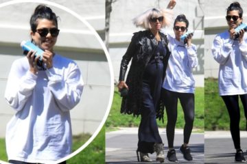 Kourtney Kardashian cuts a relaxed figure in a sweatshirt and leggings