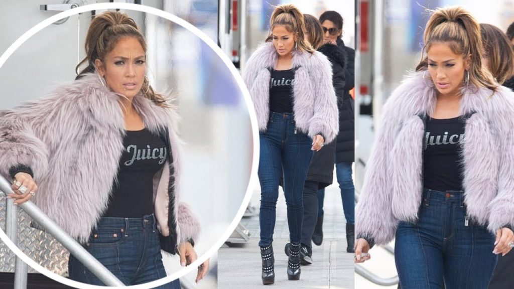 Jennifer Lopez looked serious mood in costume while on the New York set of her new movie Hustlers