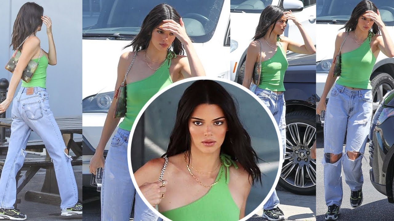 Kendall Jenner in green tank top as carries Mona Lisa purse to meet up